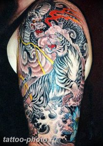 фото тату тигр и дракон 07.12.2018 №021 - tattoo tiger and dragon - tattoo-photo.ru